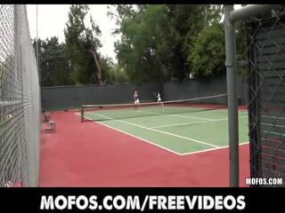 Desirable tennis MILFS are caught stretching before a match